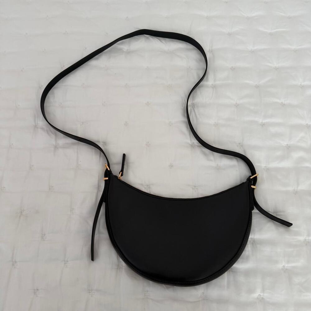 Black Madewell Crescent Bag. Comes with long strap only.